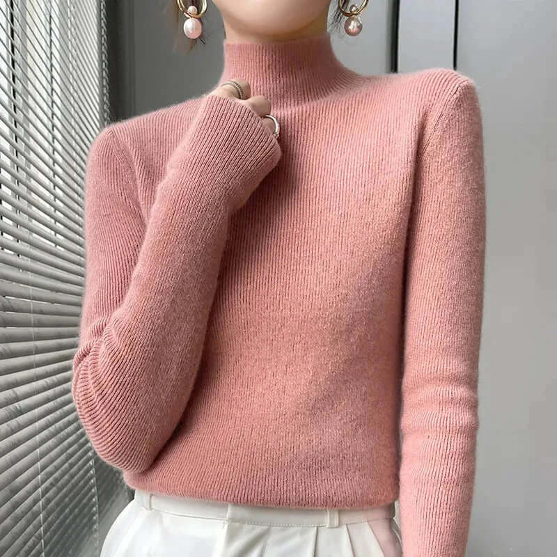 Elegant women's half turtleneck knitted pullover in versatile grey, great for winter fashion.