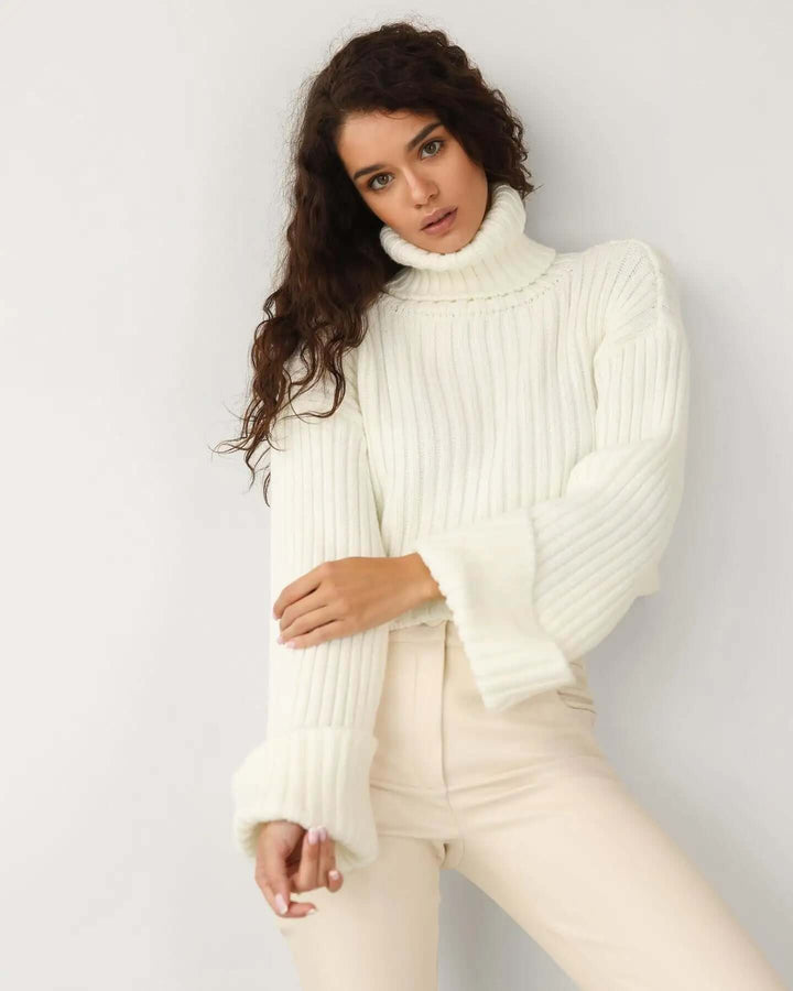 Stylish women's long sleeve knitted pullover. Comfortable & warm winter sweater, perfect for cozy fall fashion.