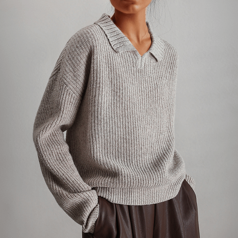 Elegant women's loose fit knitted sweater, a comfortable and soft long sleeve pullover in cream, perfect for layering.
