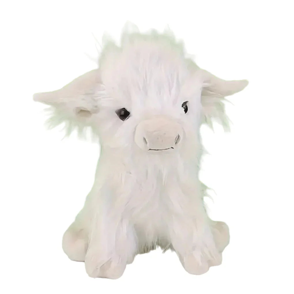Close-up of a brown & white Highland Cow plush toy, super soft, safe for babies, ideal cuddly animal gift.