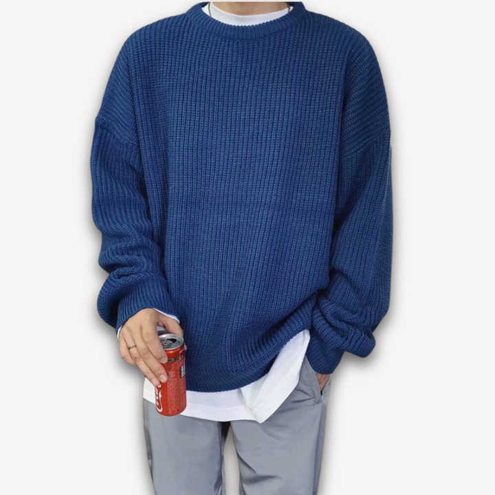 Dark green men's oversized knit sweater, soft acrylic, ribbed texture, cozy winter wear, casual elegance, warm menswear.