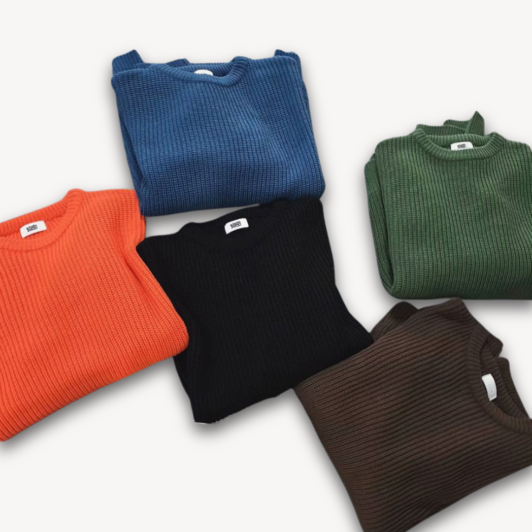 Dark green men's oversized knit sweater, soft acrylic, ribbed texture, cozy winter wear, casual elegance, warm menswear.