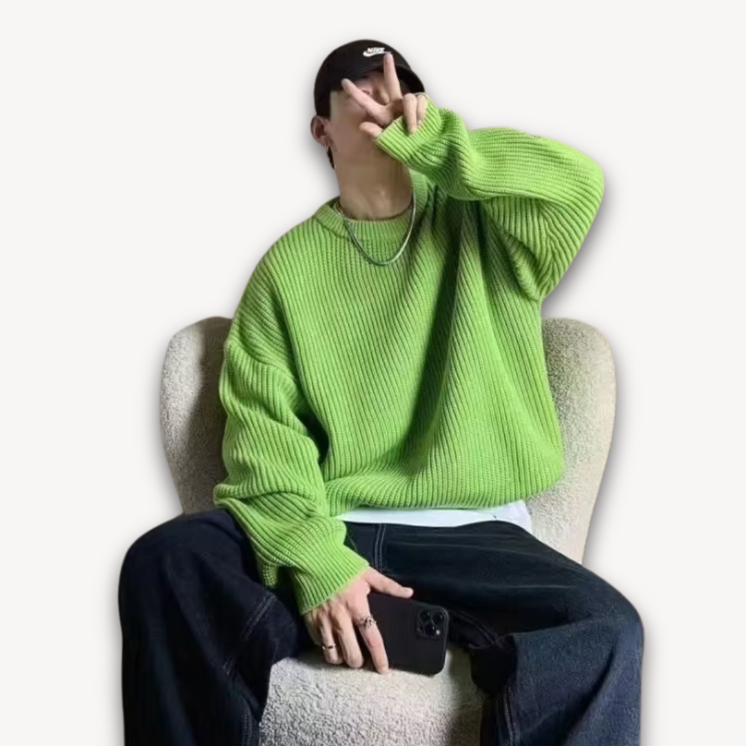 Dark green men's oversized knit sweater, soft acrylic, ribbed texture, cozy winter wear, casual elegance, warm menswear.