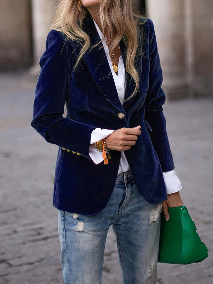Chic women's velvet blazer in dark green, smart casual outerwear with sophisticated golden buttons.