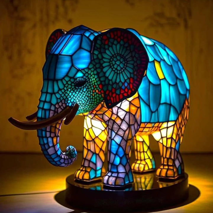 Vibrant stained glass animal table lamp. LED accent light, perfect for bedroom or living room decor.