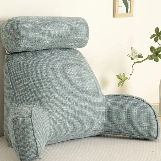 "Deluxe backrest pillow with arms and headrest in cream, featuring a soft-touch finish and side pocket for added convenience.
