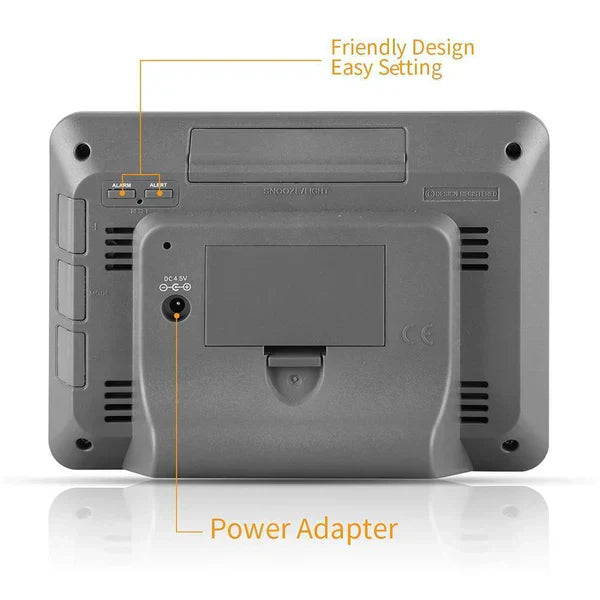 "Digital wireless home weather station with LCD screen showing temperature, humidity, and forecast icons; modern design."
