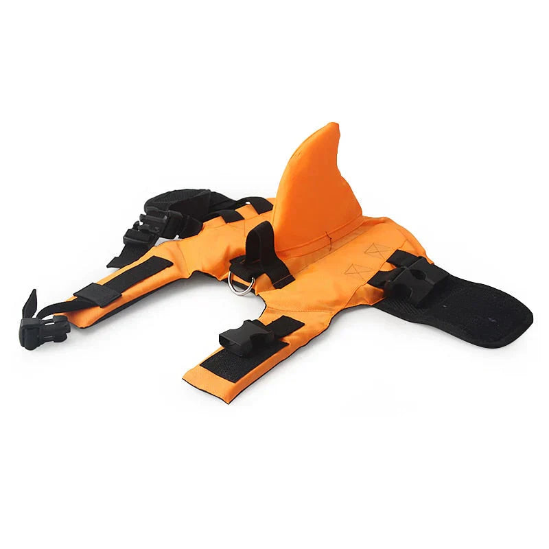 "Dog life jacket with shark fin, vibrant colors, adjustable straps, ensures pet safety and buoyancy in water adventures."