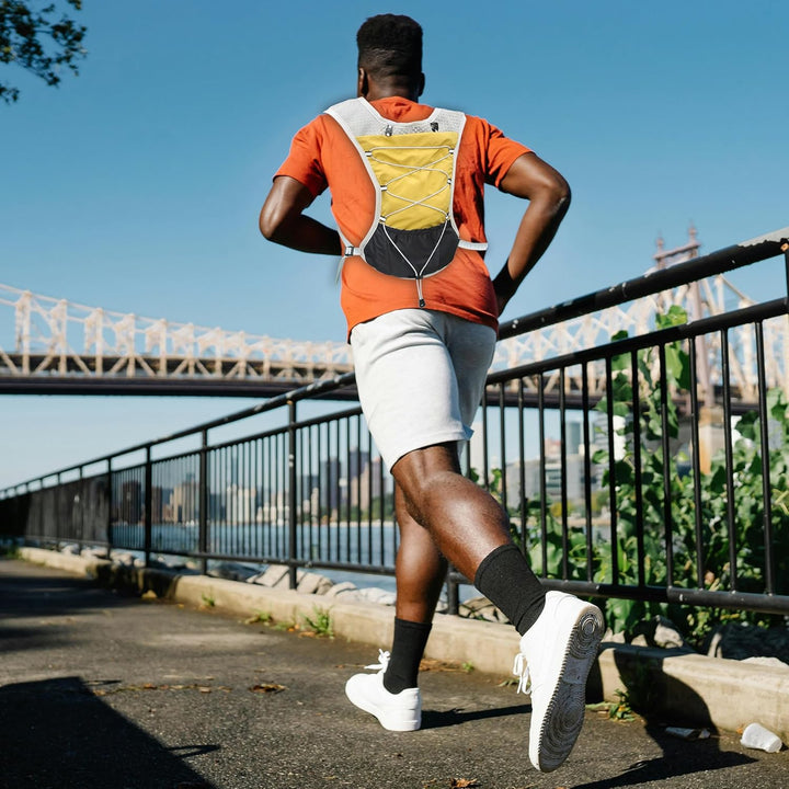 Adjustable fit hydration pack for trail running, 2L bladder, secure and bounce-free.