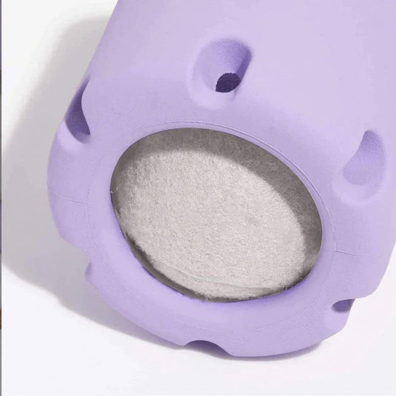 "Durable rubber dog chew toy with hidden tennis ball, designed for interactive play, available in vibrant colours."
