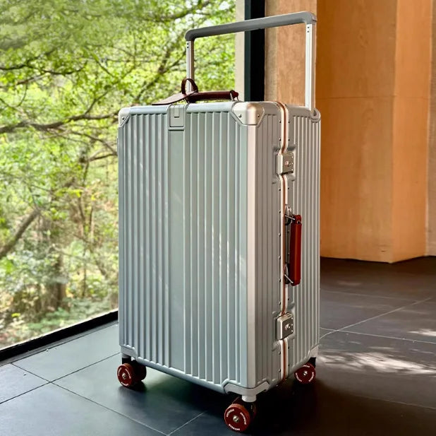 Sturdy, secure hard-shell travel suitcase with quiet spinner wheels, ensuring smooth, modern journeys.
