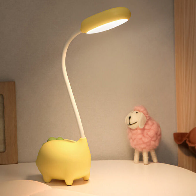 Eco-friendly T-Rex LED desk light for kids; whimsical dino shape, adjustable neck, soft eye-caring light; available in yellow