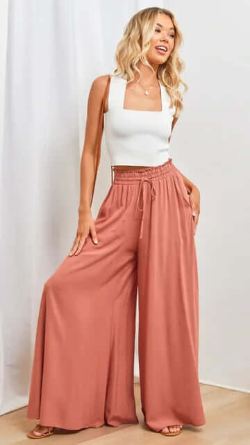 Back view of women's loose fit drawstring pants, showcasing comfortable and fashionable everyday style.