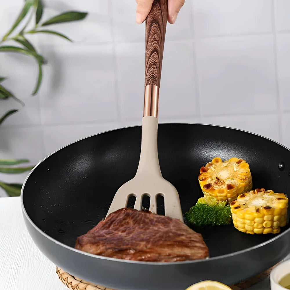 Elegant 10-piece silicone utensil set, heat resistant, features ergonomic handles, minimalist design for modern kitchens.