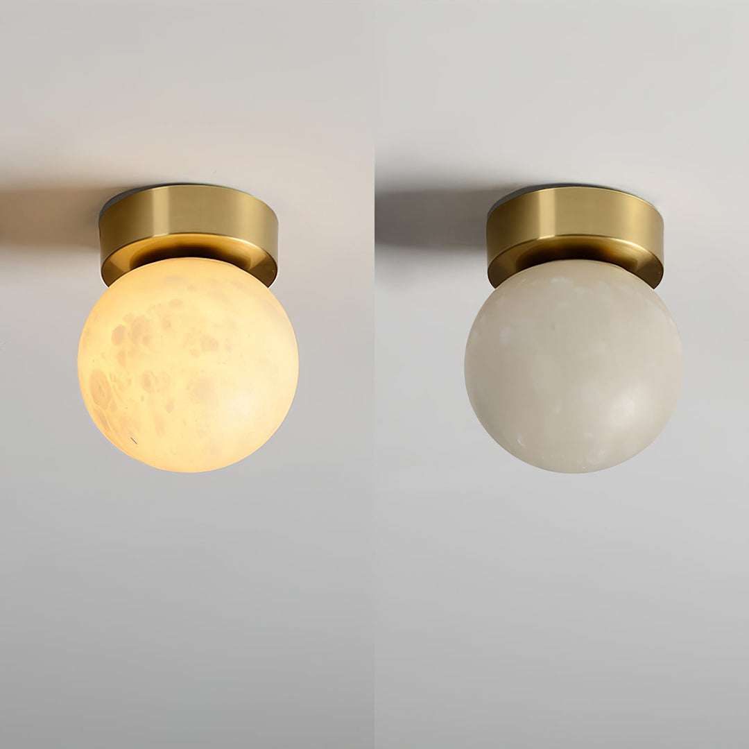 Elegant alabaster brass ceiling lamp, warm ambient light, celestial glow, sophisticated brass detailing, modern design.