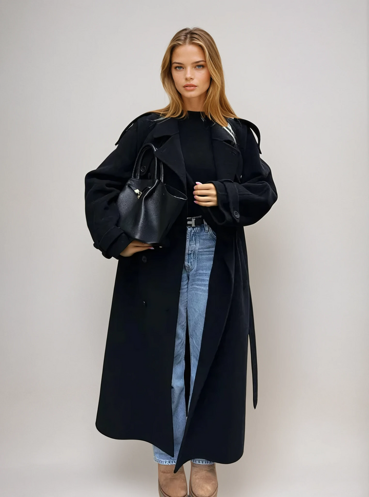Elegant black double-breasted long coat for women, perfect for sophisticated style & outerwear fashion.