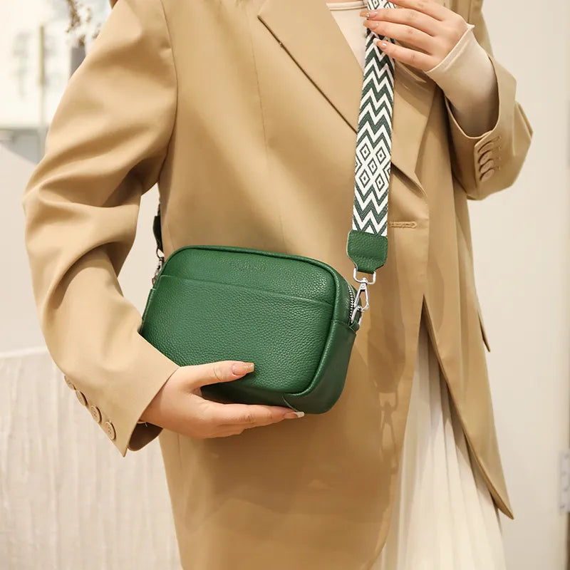 Women's designer quality leather crossbody bag with an adjustable strap, ideal for a refined look.