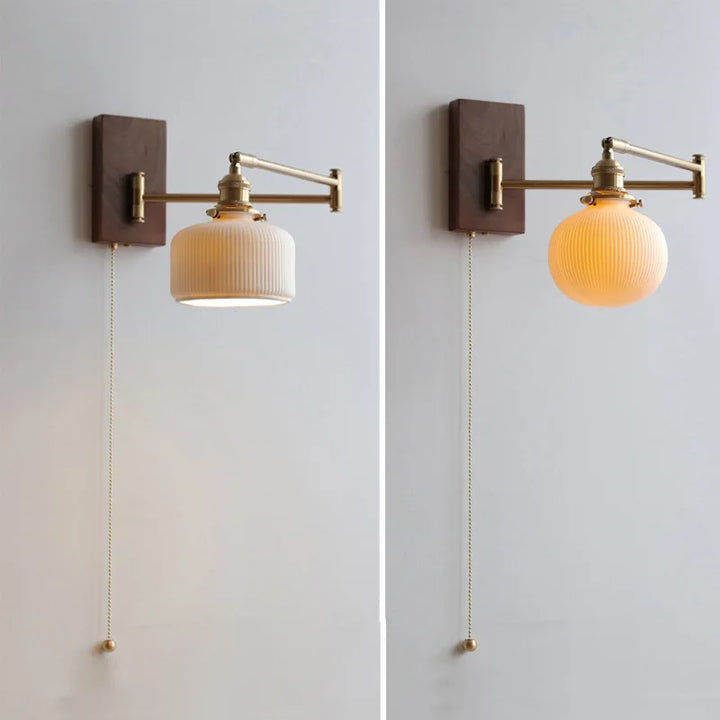"Elegant ceramic wall lamp with wooden plate, featuring a modern design in cylinder or globe lampshade for stylish interiors.