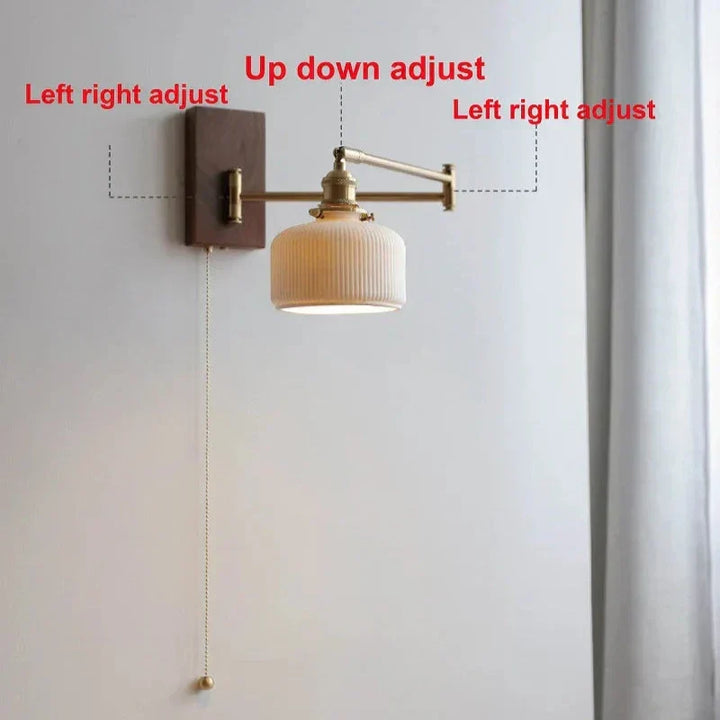 "Elegant ceramic wall lamp with wooden plate, featuring a modern design in cylinder or globe lampshade for stylish interiors.