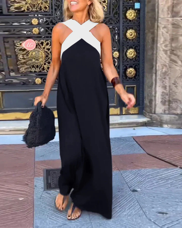 Women's flattering cross-neck maxi dress, long & flowing for elegant comfort. A versatile choice.