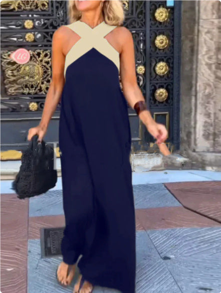 Flattering cross-neck maxi dress for women, elegant & flowing, perfect for any figure. Day to evening.
