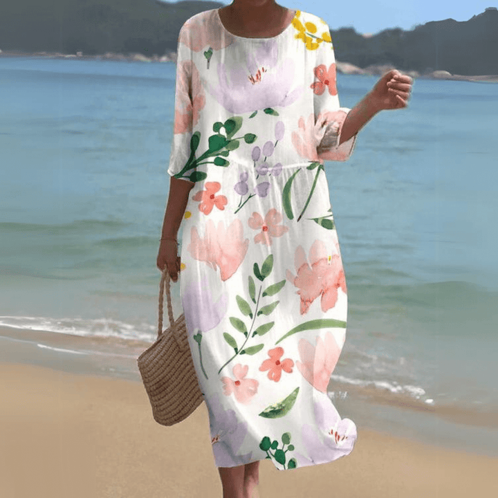 Women's versatile flowy midi dress, an elegant and comfortable choice for effortless summer fashion.