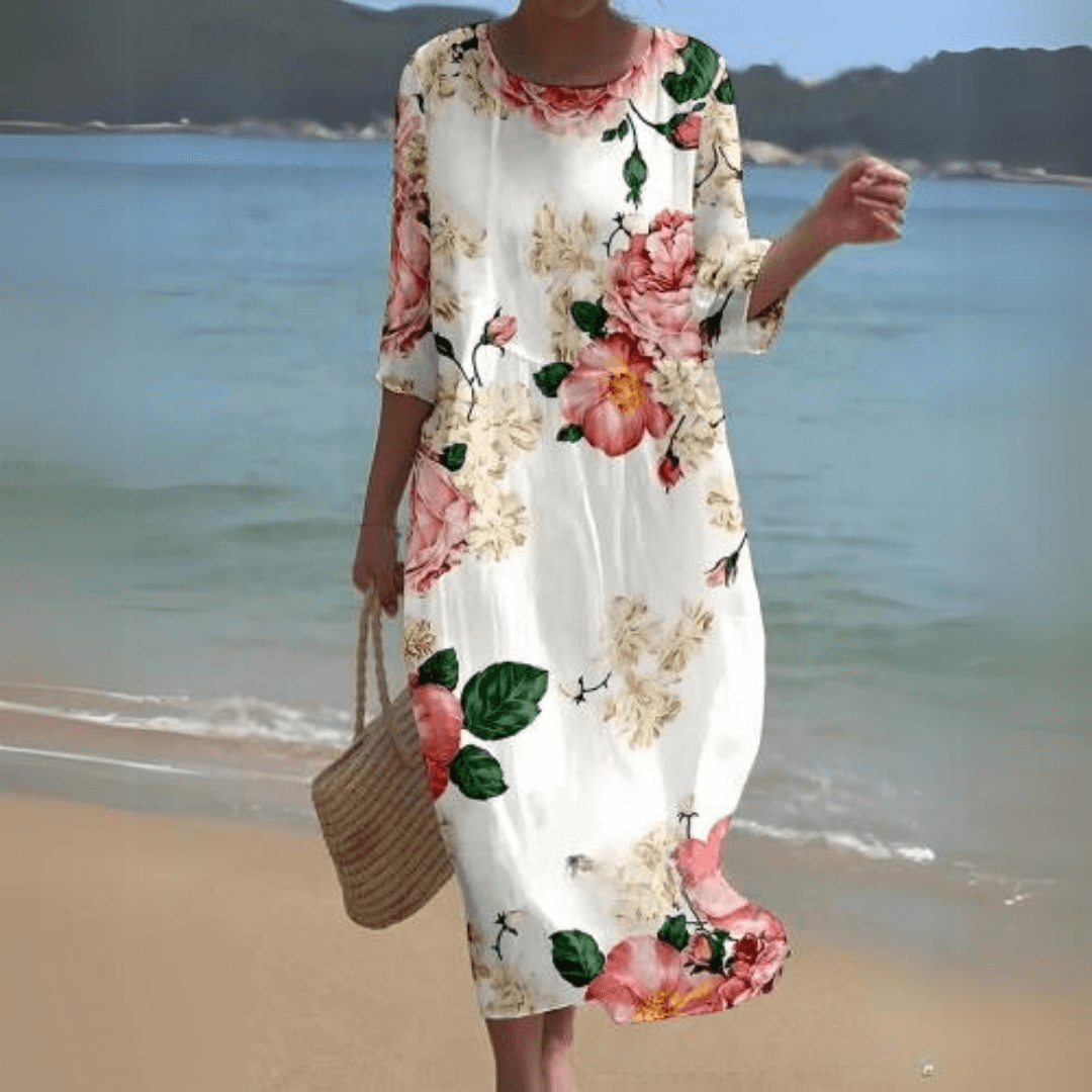 Beautiful women's elegant flowy midi dress, a perfect choice for sophisticated summer apparel.