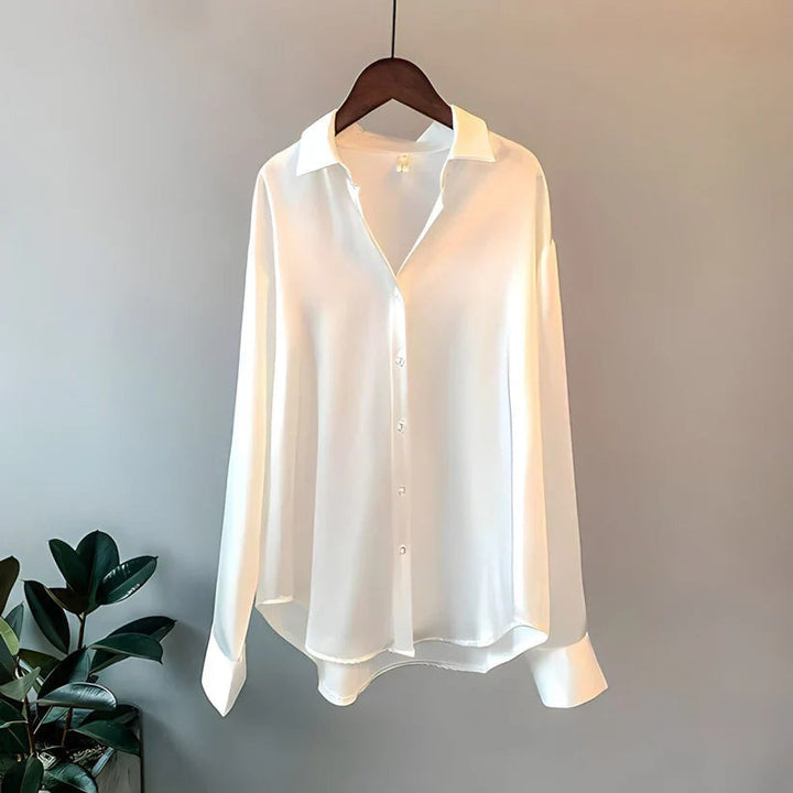 Soft flowy elegant women's blouse with long sleeves, a collared top for sophisticated style & comfort.