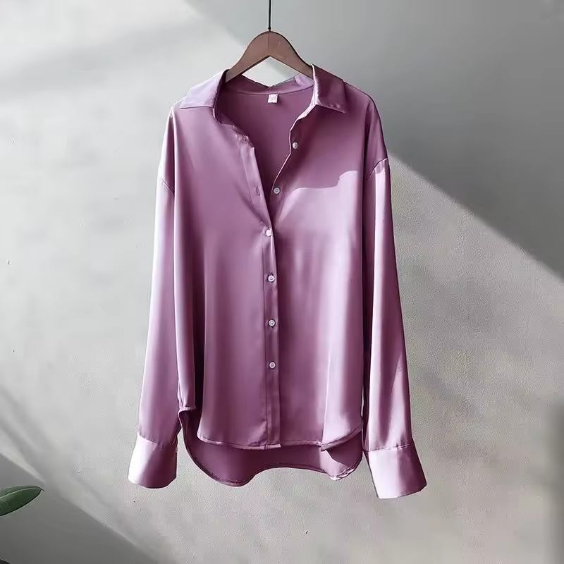 Front view of women's elegant flowy long sleeve blouse, perfect for work or sophisticated casual outings.