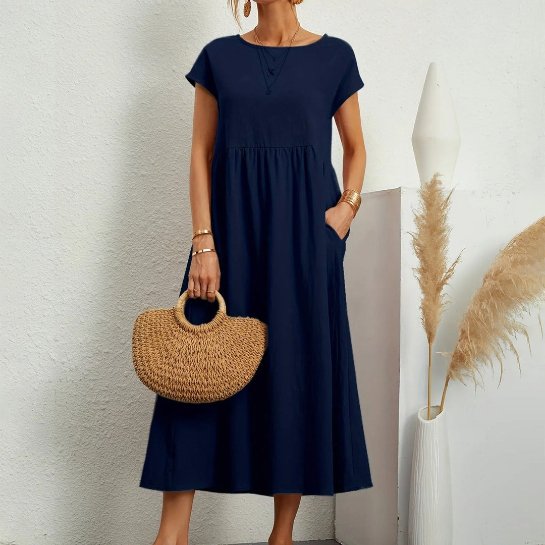 Beautiful women's flowy maxi dress, providing elegant movement and comfortable chic summer wear.