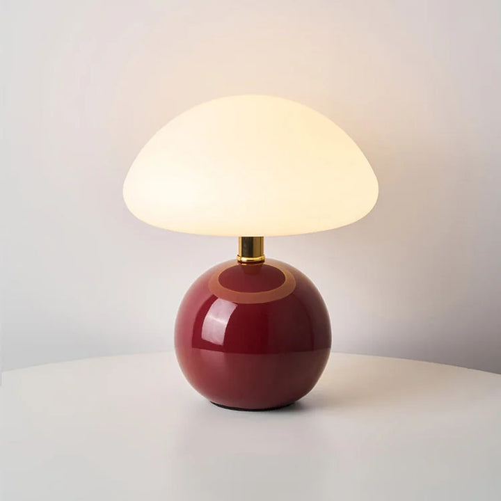 "Elegant French cream mushroom table lamp with adjustable LED colors, inspired by whimsical design and Bauhaus style."