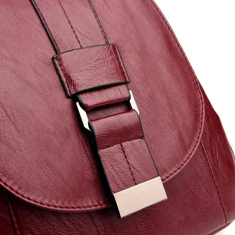 Elegant sheepskin leather women's backpack, water-resistant, perfect for any occasion.