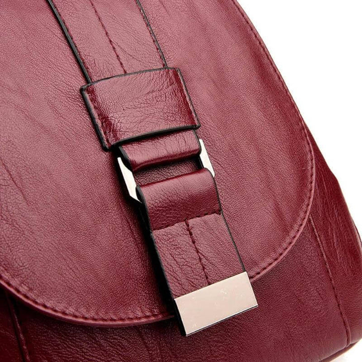 Elegant sheepskin leather women's backpack, water-resistant, perfect for any occasion.