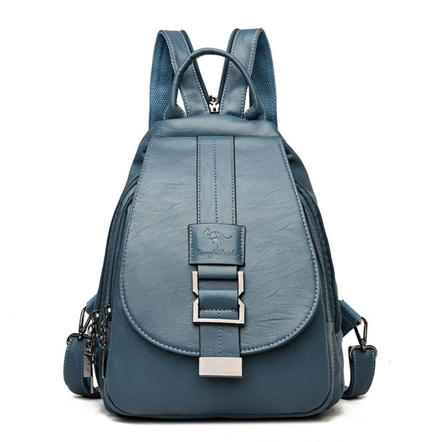 Stylish women's water-resistant sheepskin leather backpack, open, showing interior.