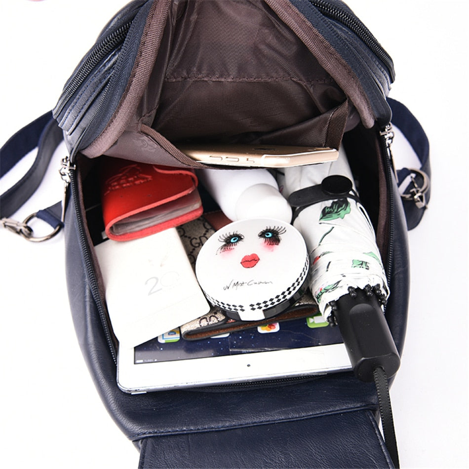 Premium women's water-resistant leather backpack with anti-theft features.