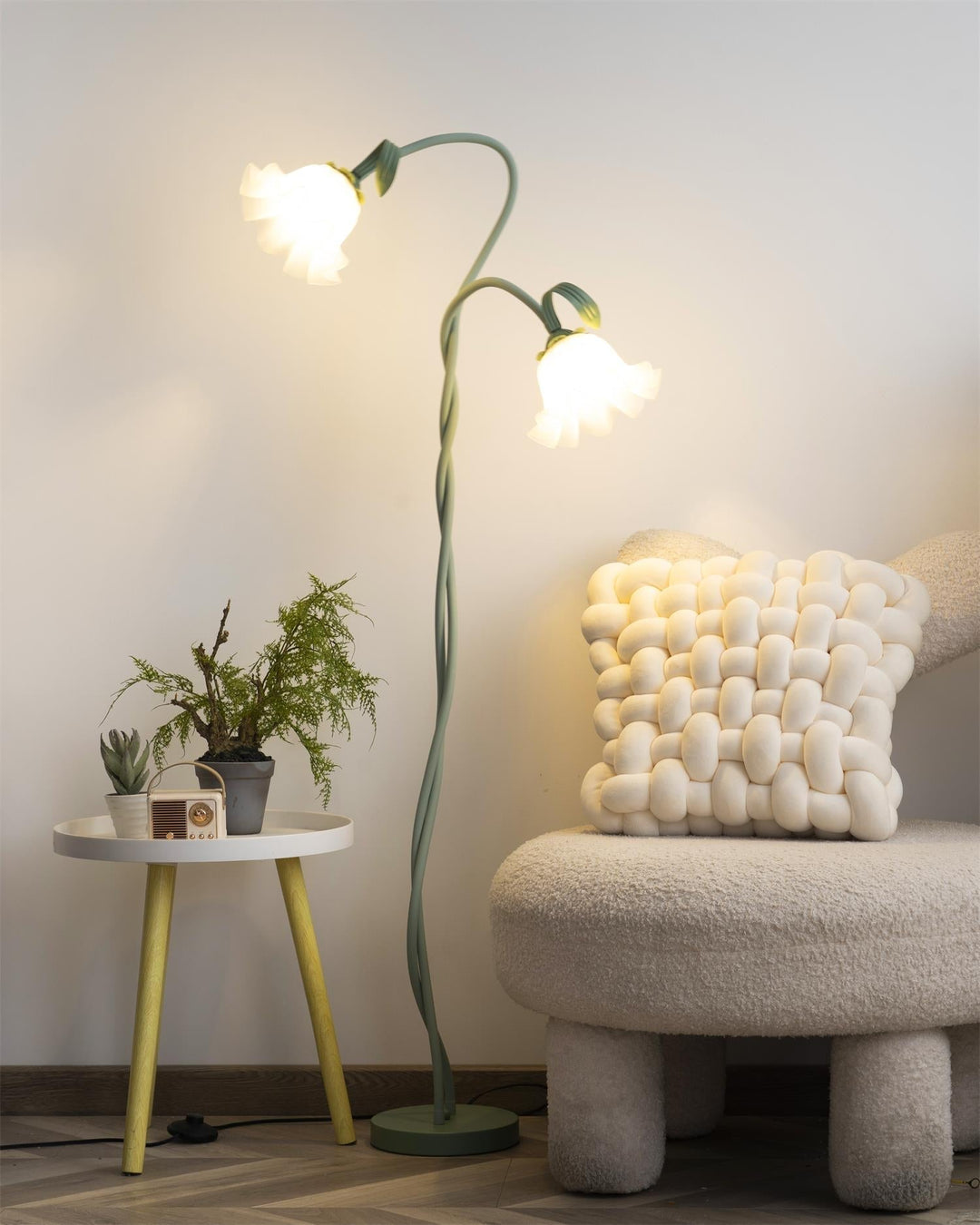 Elegant green floor lamp with white calla flower accents, matte finish, and metal construction, enhancing home decor.