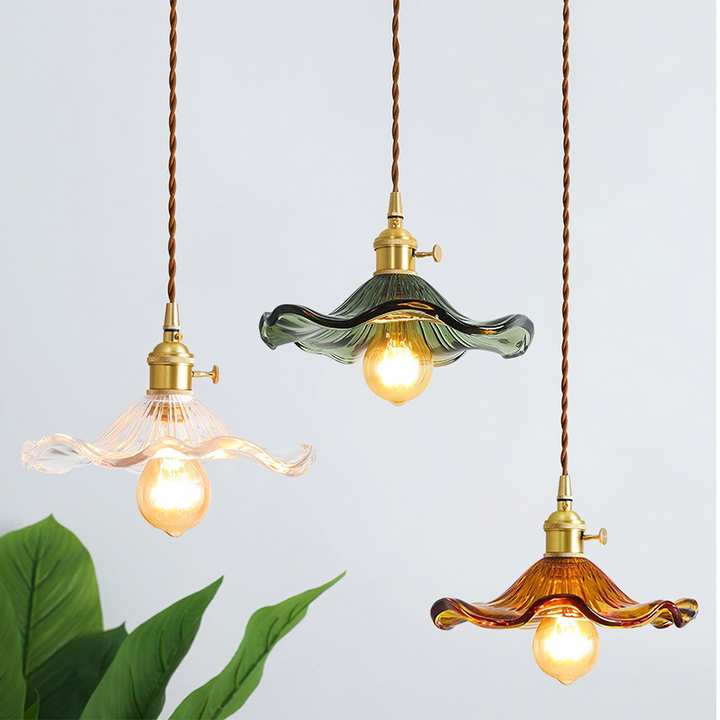 "Elegant Hibiscus Glass Pendant Light, floral design, clear and green colors, adds sophistication with ambient glow, home dec
