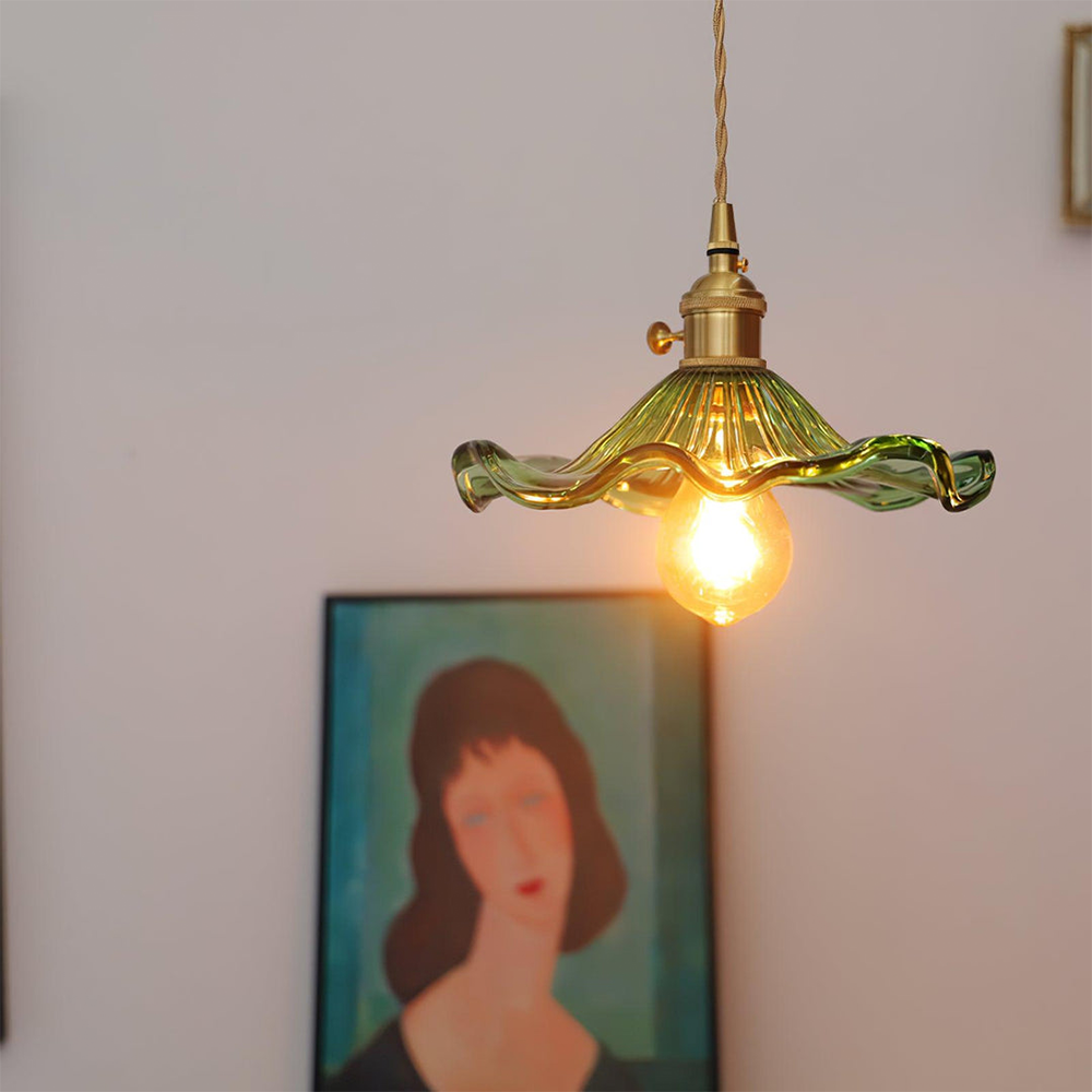 "Elegant Hibiscus Glass Pendant Light, floral design, clear and green colors, adds sophistication with ambient glow, home dec