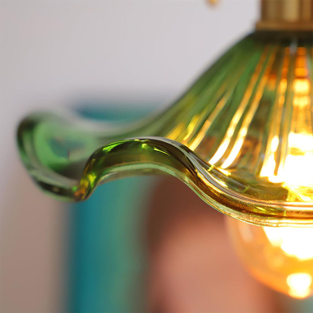 "Elegant Hibiscus Glass Pendant Light, floral design, clear and green colors, adds sophistication with ambient glow, home dec