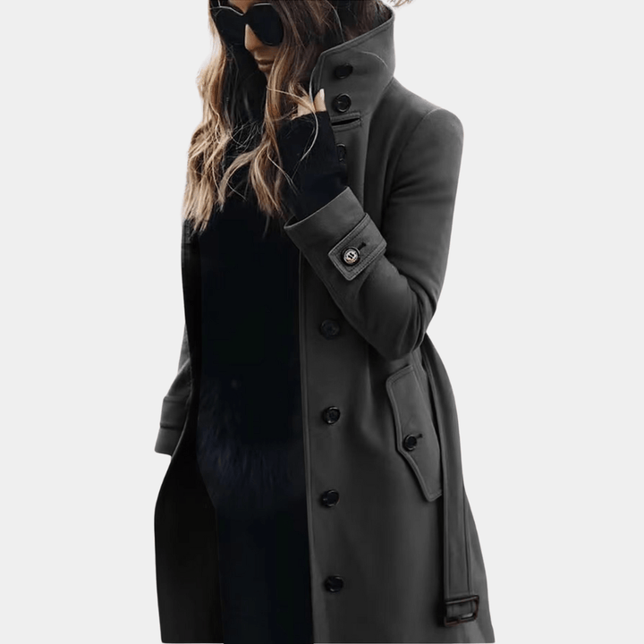 Women's elegant warm trench coat, long double-breasted with tailored fit, ideal for sophisticated winter outerwear.