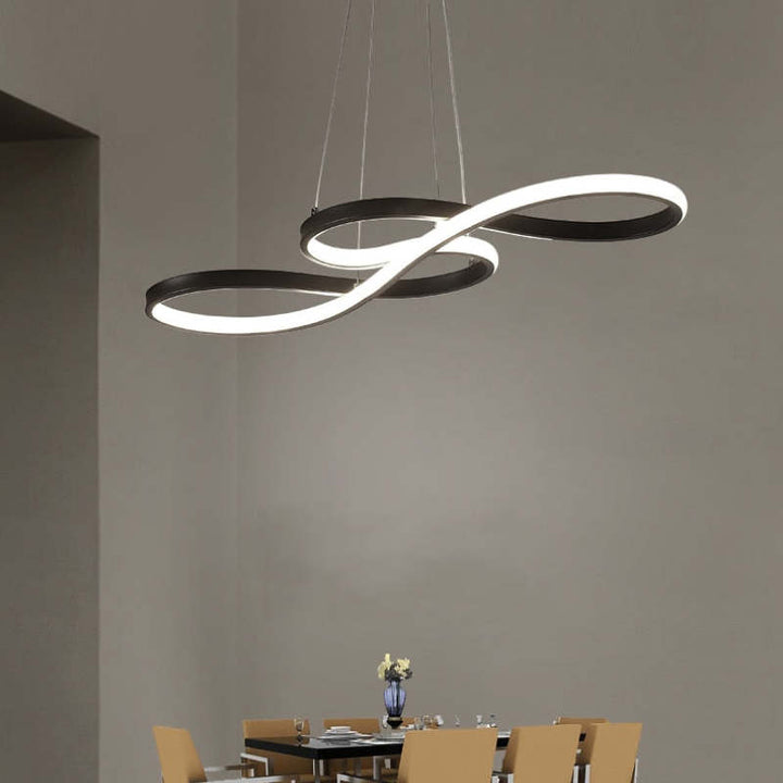 "Elegant LED pendant lamp with musical notes design in metallic black, white, and gold, creating a contemporary aesthetic."
