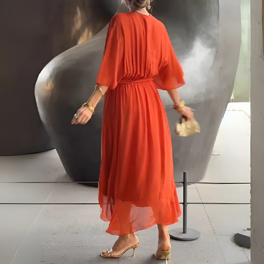 Summer-ready women's elegant lightweight wrap dress. Midi length, V-neck, adjustable for comfortable, versatile fashion.