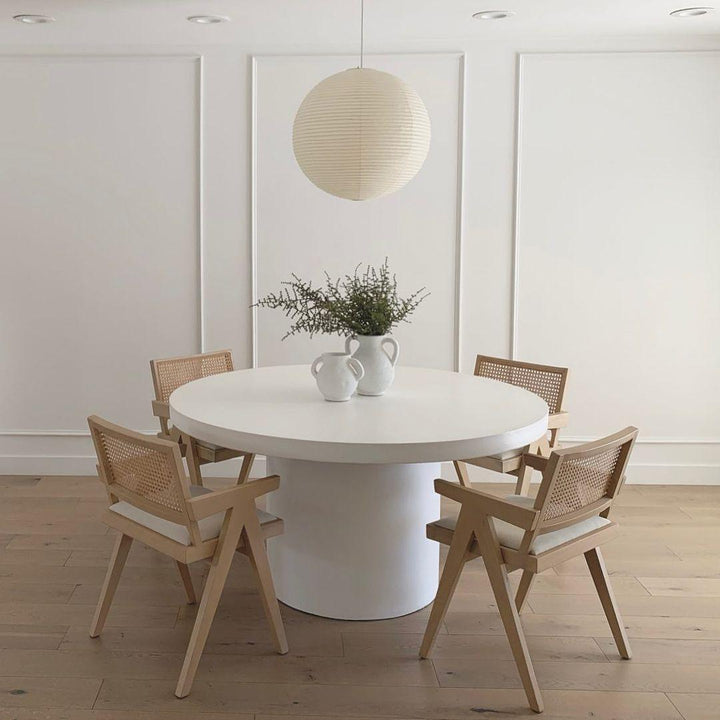 "Elegant modern Japanese paper lantern pendant light with a warm glow, blending contemporary and mid-century design."