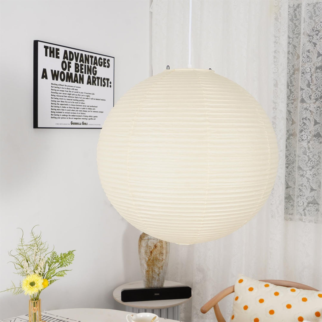 "Elegant modern Japanese paper lantern pendant light with a warm glow, blending contemporary and mid-century design."