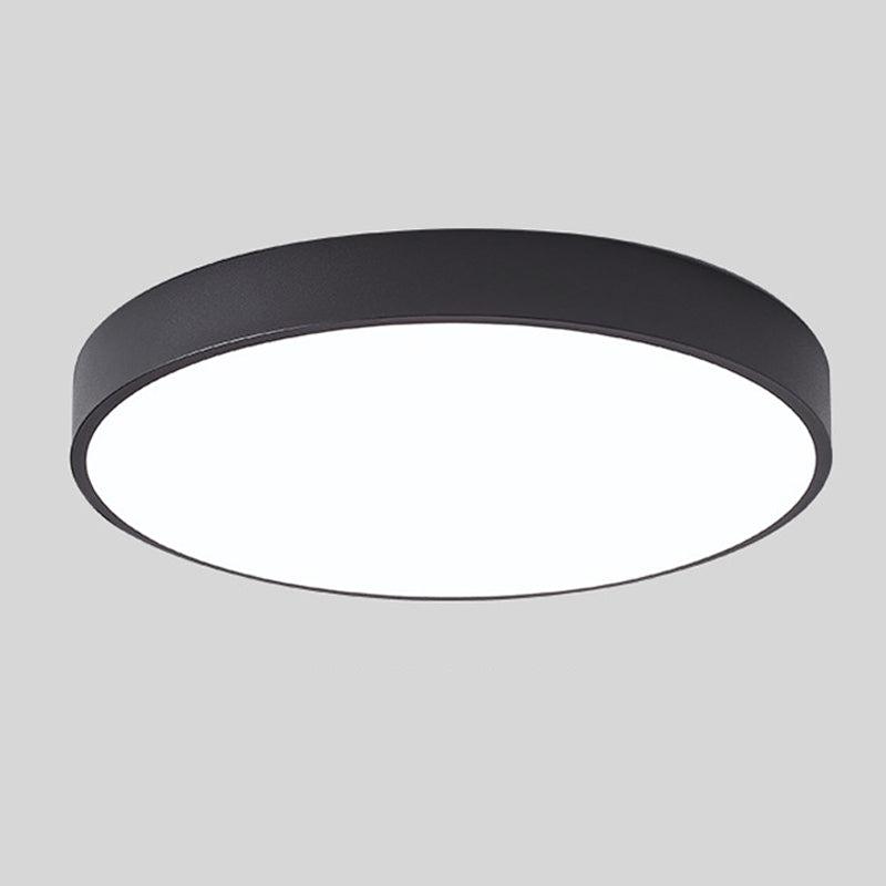 "Elegant Scandinavian Circular LED Ceiling Light Fixture with minimalist design, warm glow, and wood finish option."