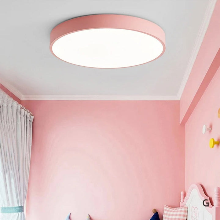 "Elegant Scandinavian Circular LED Ceiling Light Fixture with minimalist design, warm glow, and wood finish option."