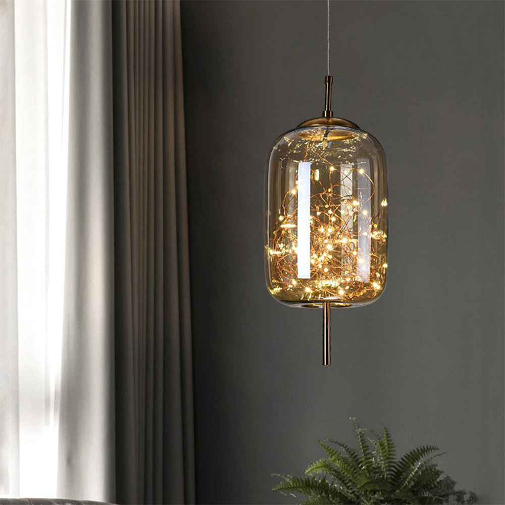 Elegant Scandinavian LED pendant light with sleek glass design; perfect for modern spaces, enhancing ambiance with soft glow.