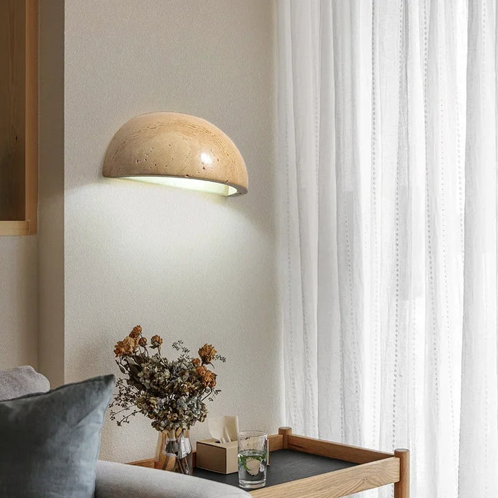 "Elegant stone-textured LED wall light, energy-efficient, modern lamp for living rooms and bedrooms with warm ambiance."
