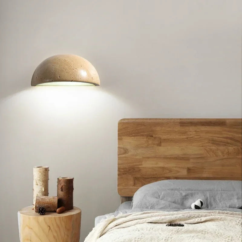 "Elegant stone-textured LED wall light, energy-efficient, modern lamp for living rooms and bedrooms with warm ambiance."