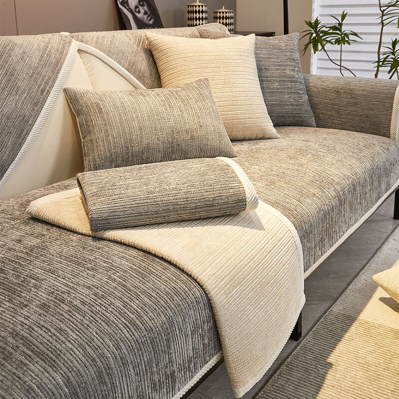 Elegant waterproof chenille sofa cover in soft hues, offering antimicrobial protection and sleek design for home decor.